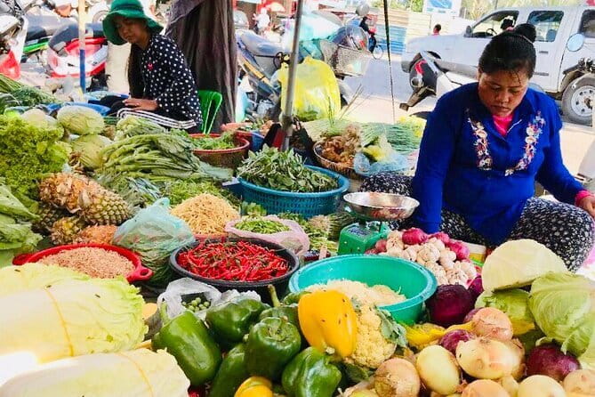 1-Day Angkor Wat Cycling Tour: Scenic Bike Adventure in Siem Reap - Pickup, bikes, snacks, and the stuff you actually get