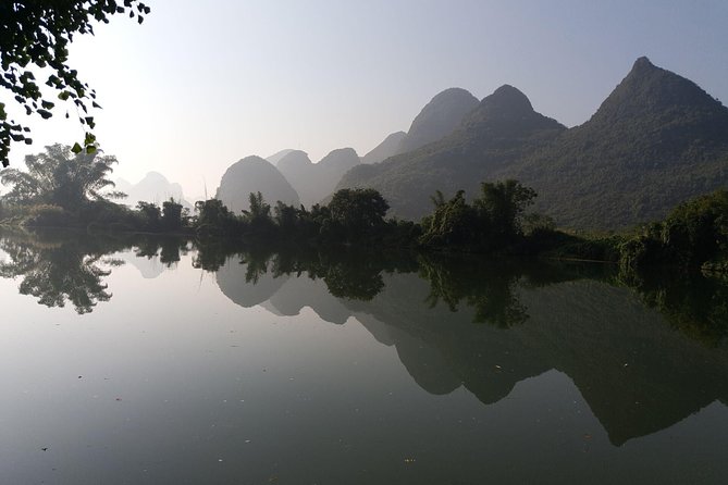 1 Day Yangshuo Countryside Cycling and Yulong bamboo boat Private Tour - Bamboo rafting on the Yulong River: what you’re actually buying