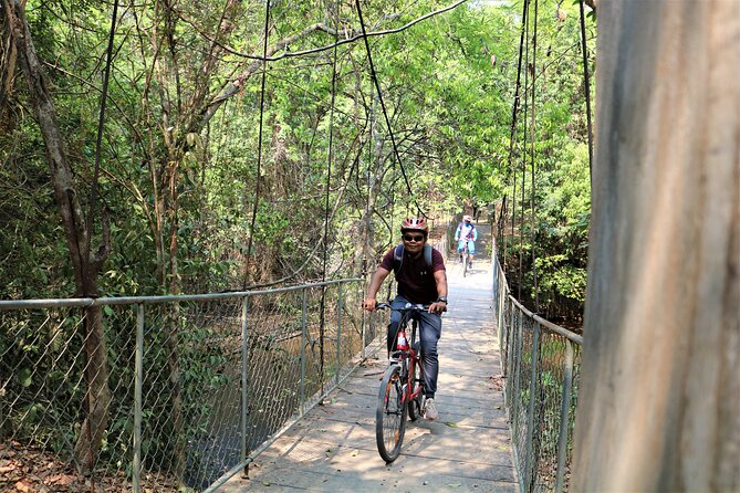 Angkor Sunrise Expedition Cycling Through Serene Backroads - Angkor Thom: feeling the moat-and-jungle vibe from the bike seat