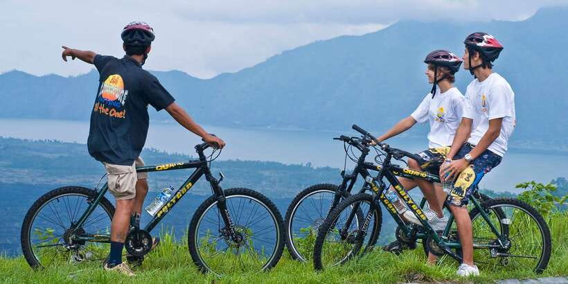 Bali: Mountain Bike Tour and River Rafting with Lunch - Pedaling 25 km through valleys, temples, and village life