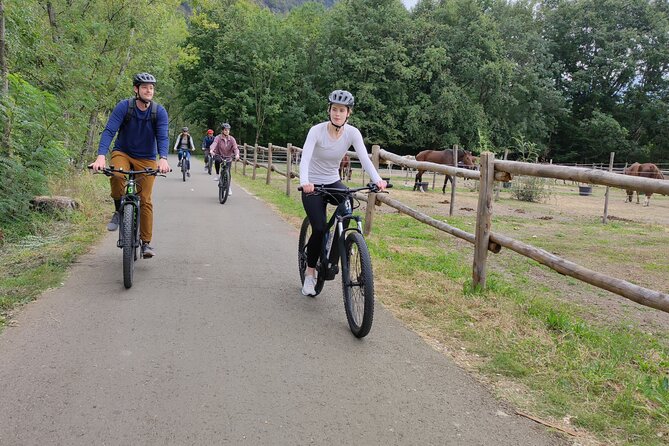 BikeBrix Scenic Cycling Tour in Lake Maggiore Ascona Locarno - The Stops: Waterfall Magic, a Popular Spot, and a Valley-Name Town