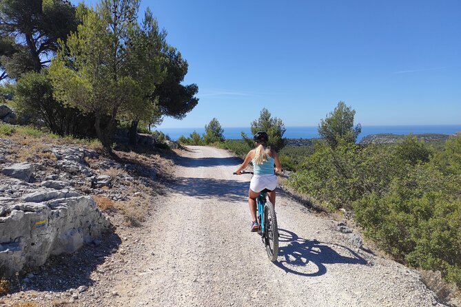 Cassis : Two Calanques Tour by Electric Mountain Bike - Cassis Village in 10 Minutes: Roman Roots and Cliff-to-Sea Views