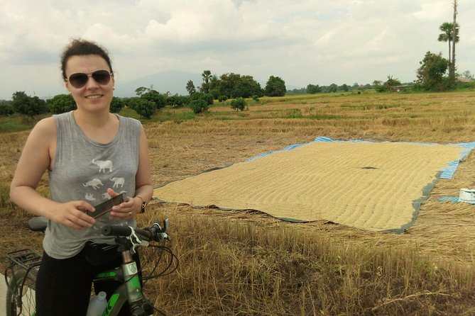 Chiang Mai Paradise Full-Day Cycling Adventure Tour - Temples and Paper Garlands: Where Faith Meets Everyday Skill