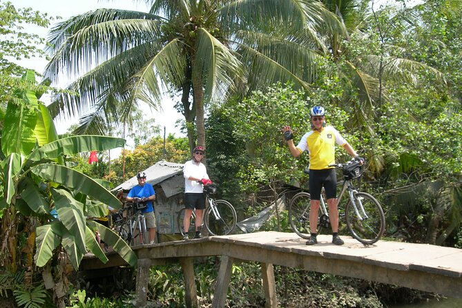 Cycling Mekong Delta Ben Tre 2days - Day 2 around Ben Tre province: coconut workshops, bridge-area roads, and lunch with locals