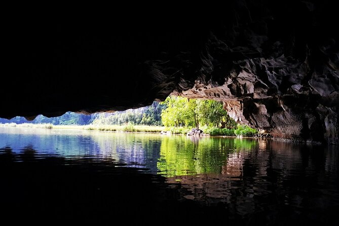 Discover Trang An Natural World Heritage, Bich Dong Pagoda, Cycling Day Tour - Trang An grottoes by small boat: caves, cliffs, and the Sao Khe River feel