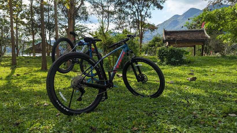 From Luang Prabang: Guided Mountain Bike Tour with Lunch - Optional add-on: kayaking to Pak Ou Caves and sunset cruising