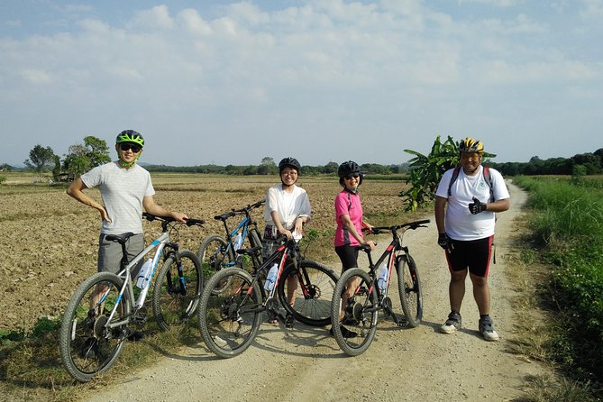 Full Day Cycling Amazing Chiangrai countryside and the White temple - The guides: Amon and Bee bring the route to life