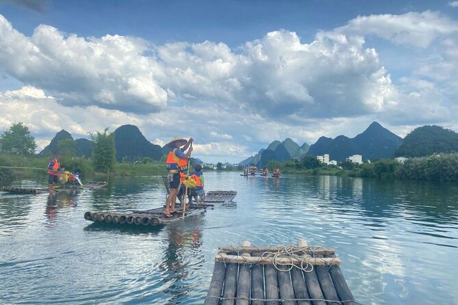 Full-day Tour: Cycling, Rafting & SanjieLiu Outdoor Water Theatre - Yulong River Bamboo Rafting: Karst Views at Water Level