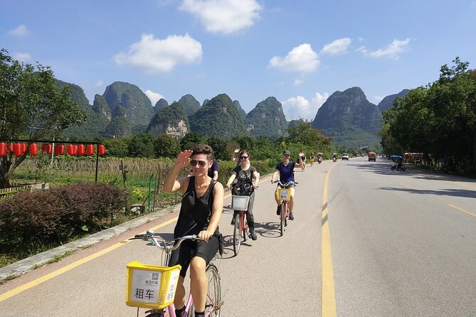 Full-day Tour: Cycling, Rafting & SanjieLiu Outdoor Water Theatre - Moon Hill Climb: The Famous Hole and the Payoff View
