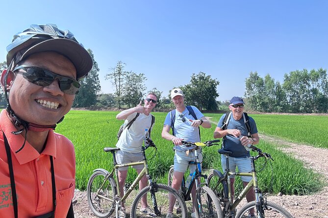 Half Day Countryside Cycling in Sukhothai - Dirt road through rice paddies: scenery, rhythm, and timing