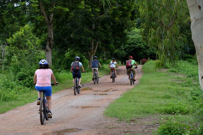 Half Day Cycling Tour to the White temple - Stop 1: Villages, farms, and the Lao River ride out of town