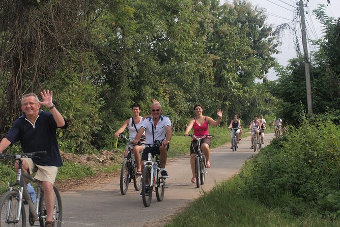 Half-Day Lanna Countryside Cycling Tour in Chiang Mai - Rice fields, stilt houses, and a real village school stop