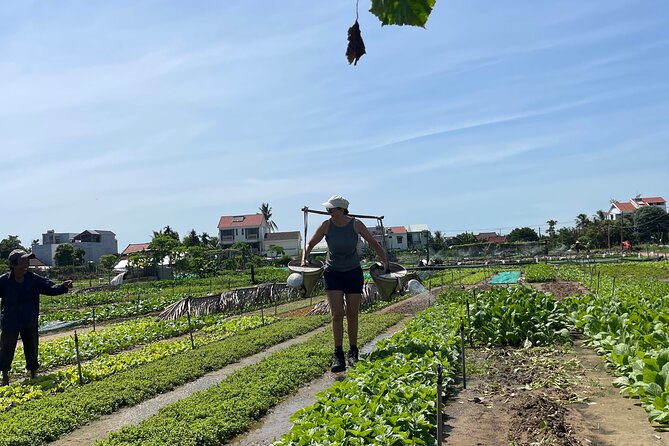 Hoi An countryside cycling Tour,Basket Boat-organic farming-lunch - Bay Mau Coconut Forest and Basket Boats: Where Water Turns Into Work