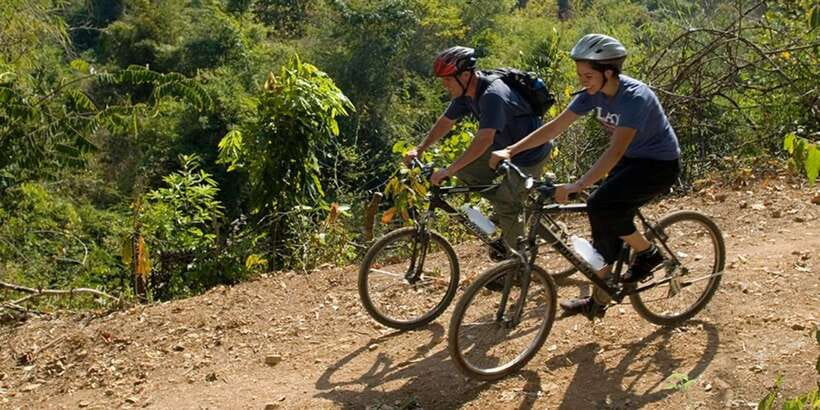 Luang Prabang: Countryside Mountain Bike Tour with Lunch - Lunch by the river: relaxing break, but plan for the real world