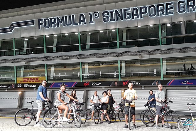 Marina Bay Night Cycling Tour - Singapore National Stadium at night: modern scale up close