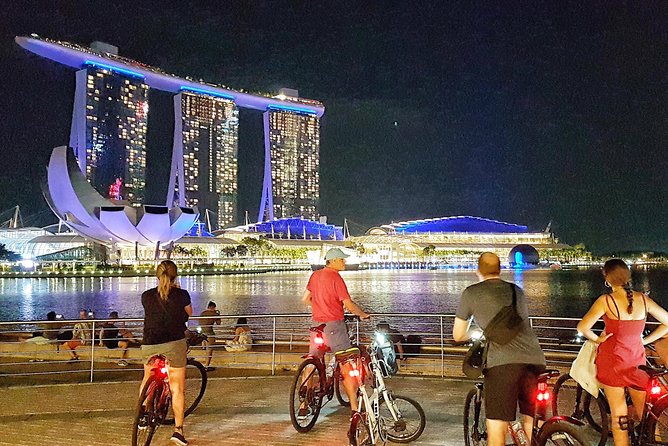 Marina Bay Night Cycling Tour - Singapore Flyer and the F1 Pit area: skyline views with racing energy