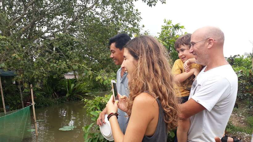 Mekong Day Tour by Car:Cai Be market, Local Island & Cycling - Sampan ride through small canals: the quiet part of the day