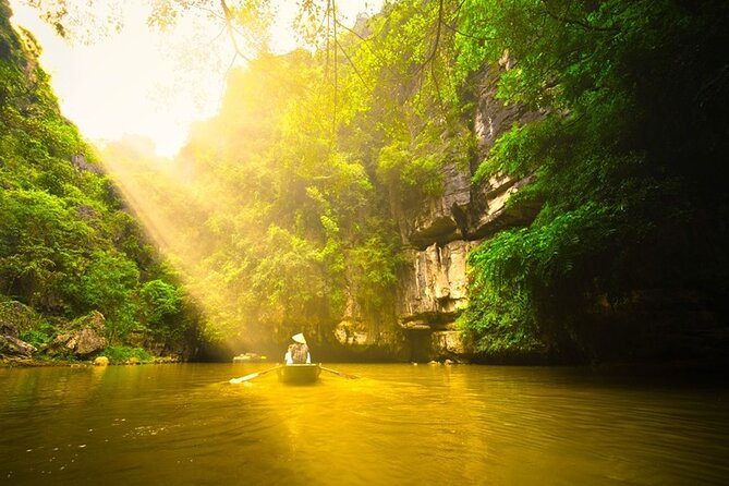 Ninh Binh Full-Day Tour Hoa Lu Tam Coc Cycling, Boat,Buffet Lunch - Tam Coc cave boat ride: slow water, small boats, big views
