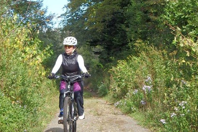 Nopporo Forest Mountain Bike Tour from Sapporo, presenting a retro Cycle cap - Birdsong and the 140 species detail you’ll actually care about