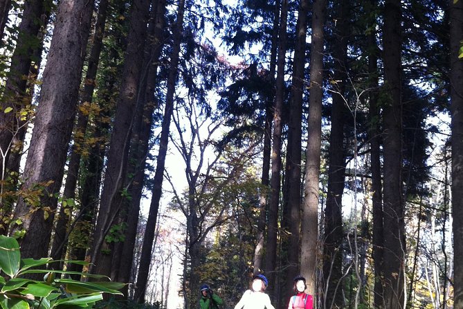 Nopporo Forest Mountain Bike Tour from Sapporo, presenting a retro Cycle cap - Bike setup first: helmet, gloves, and that retro Cycle cap