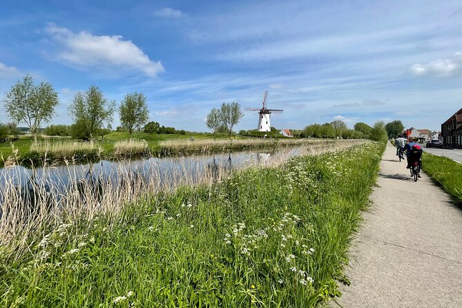 Private Bruges Countryside Cycling Tour to Damme with Guided Walk - Key highlights at a glance