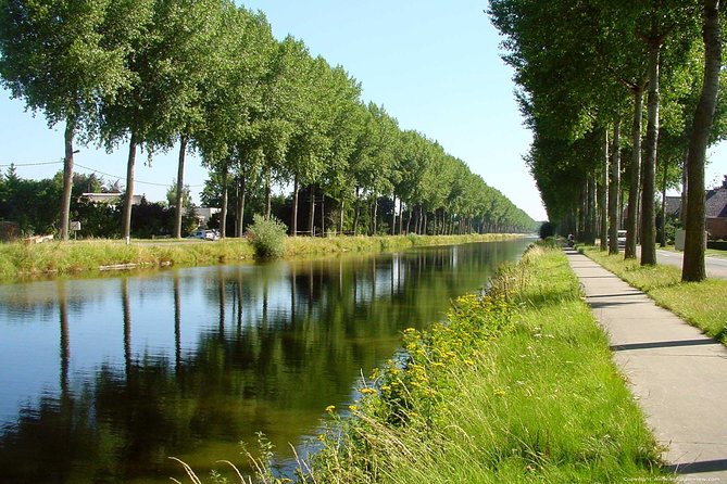 Private Bruges Countryside Cycling Tour to Damme with Guided Walk - Damme Canal: cycling beside water that feels slower than Bruges