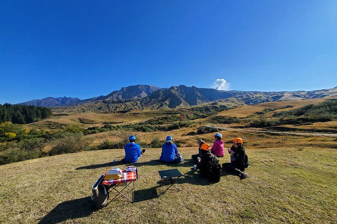 Private E-MTB guided cycling around Mt. Aso volcano & grasslands - Stops that make sense: Geopark context, Aso viewpoints, and Kusasenrigahama