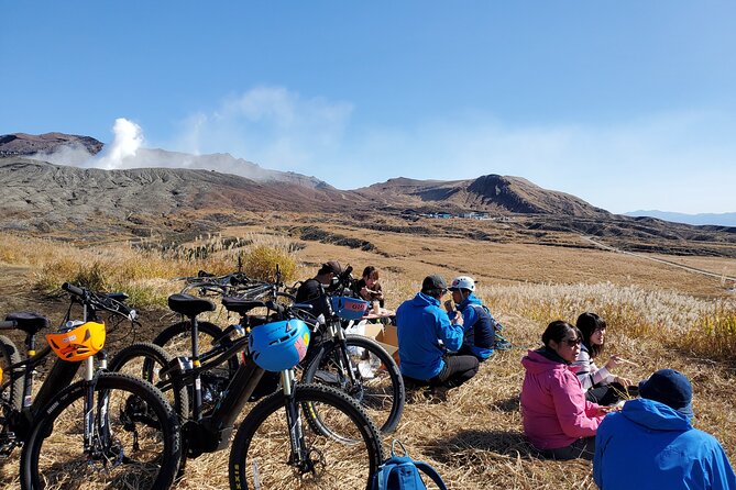 Private E-MTB guided cycling around Mt. Aso volcano & grasslands - Your guides matter: Joe-san and Fuji-san’s helpful pace