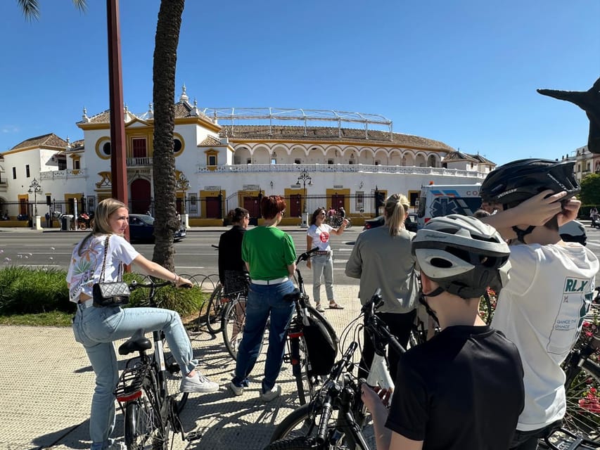 Seville: Dutch Cycling Highlights Tour with local guide - Triana and Plaza de Toros: A Change of Mood