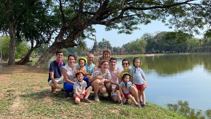 Sukhothai: Historical Park & Countryside Cycling Tour - Rice paddies and dirt-road views: Kao Laung Mountain in the distance