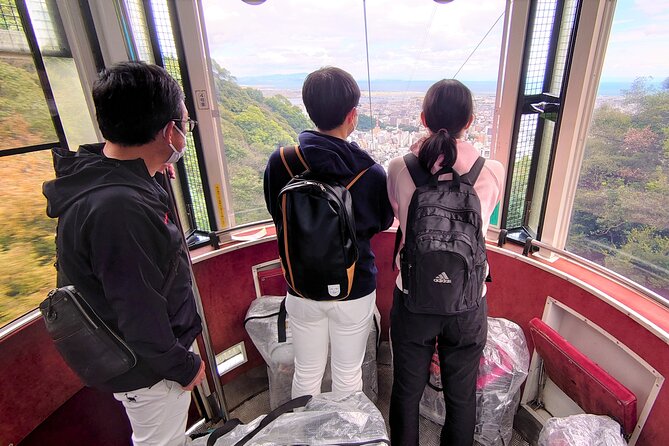 Tokushima & Mt. Bizan BROMPTON Slow Cycling Tour - Temple-quarter back alleys and the Awa Odori stage clues